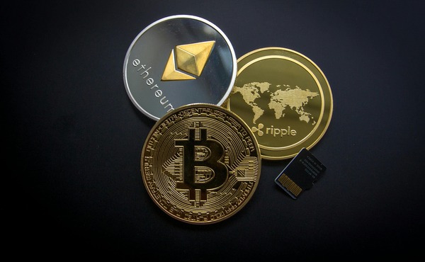 Cryptocurrency coins representing an instant no-KYC exchange